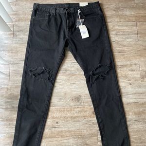 Black ripped mmml jeans size 38 
Never worn